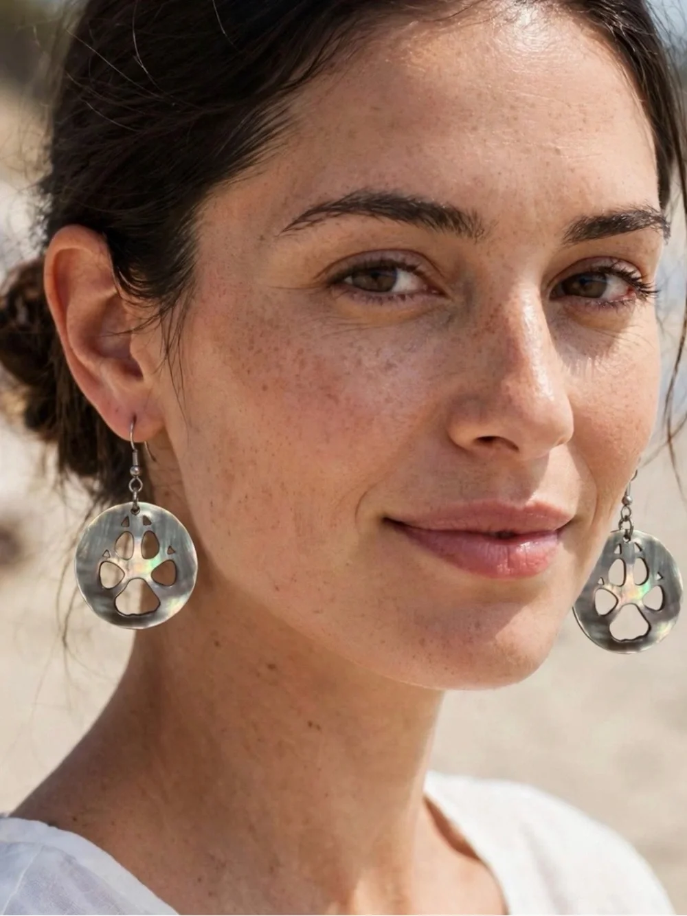 Hand carved Natural Black Lip Shell Wolf Paw Print Earrings